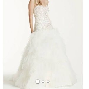 Strapless Tulle Wedding Dress with Ruffled Skirt.